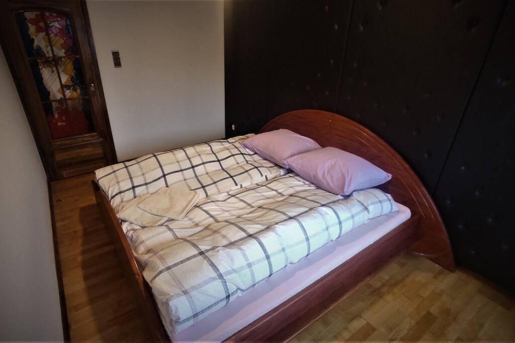 Posteľ alebo postele v izbe v ubytovaní Dom Stegny