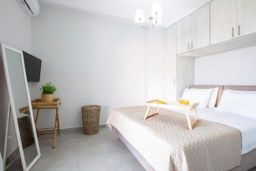 A bed or beds in a room at The Lefkadian collection G and N