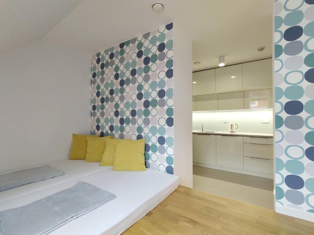 Posteľ alebo postele v izbe v ubytovaní Baron Apartments Sušice