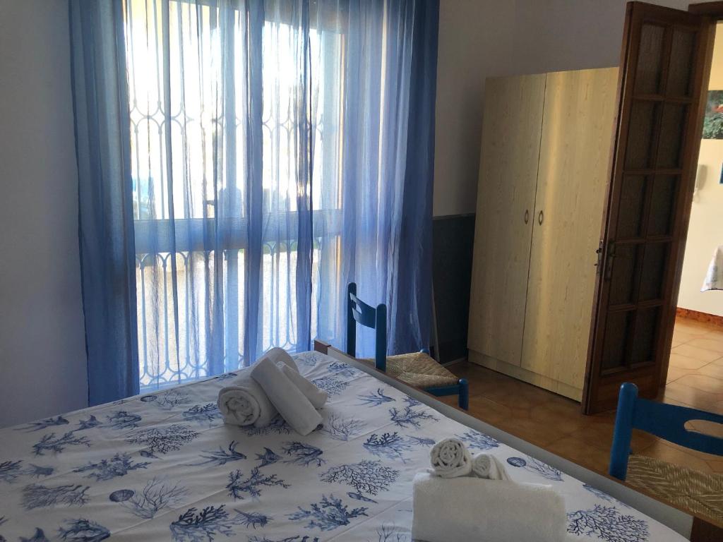 A bed or beds in a room at La sirenetta bellicosa