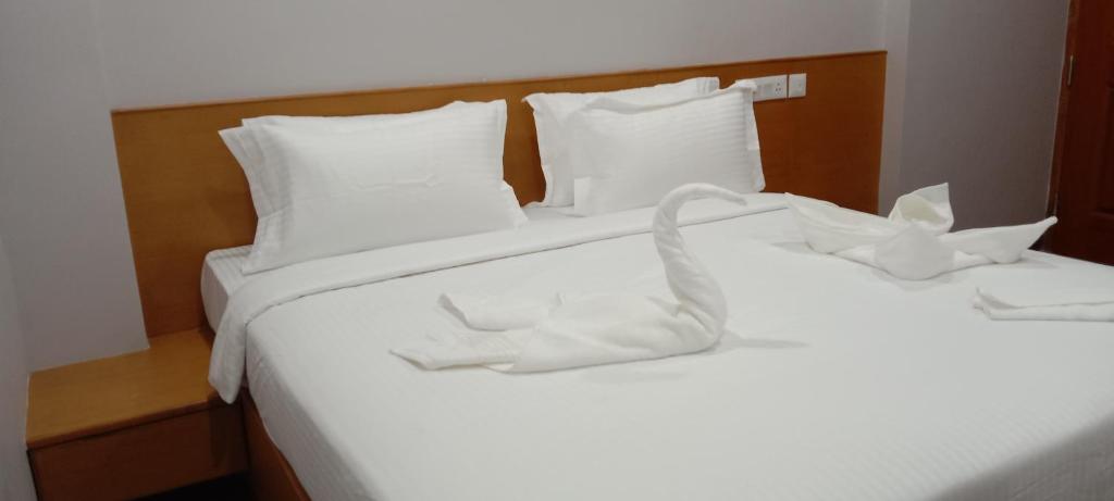 Postel nebo postele na pokoji v ubytování MOSHIS NEST