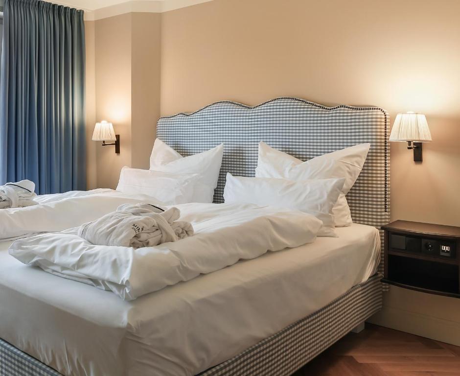 Postel nebo postele na pokoji v ubytování Mimosa House