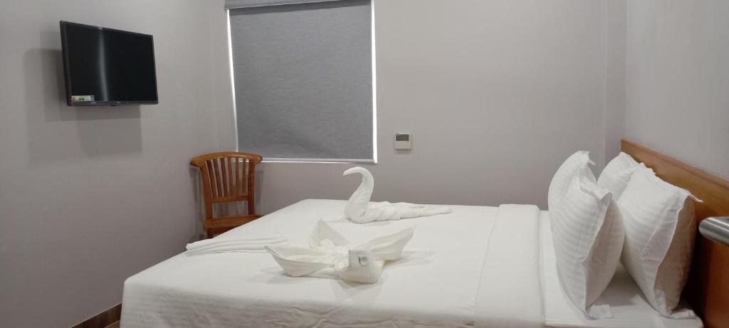 Postel nebo postele na pokoji v ubytování MOSHIS NEST