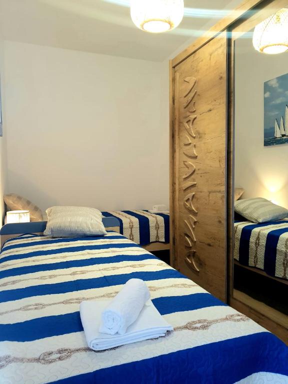 Posteľ alebo postele v izbe v ubytovaní Apartment Mateo