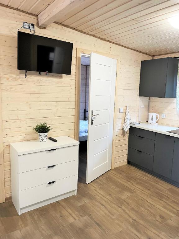Kuchyň nebo kuchyňský kout v ubytování Natura Domki Anastazewo