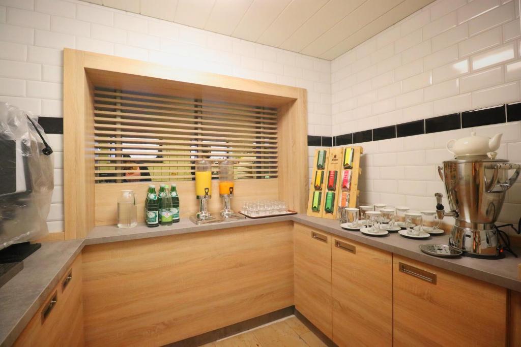 Kuchyň nebo kuchyňský kout v ubytování Hotel Franken