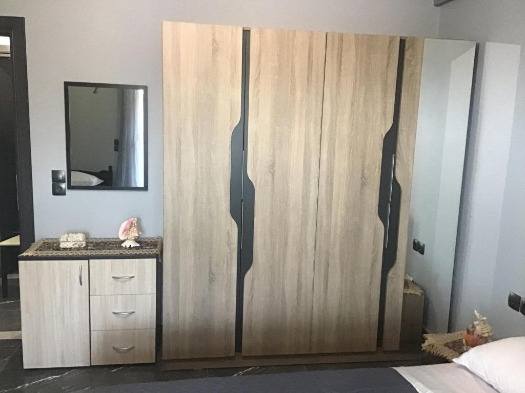 Postel nebo postele na pokoji v ubytování Zois' House