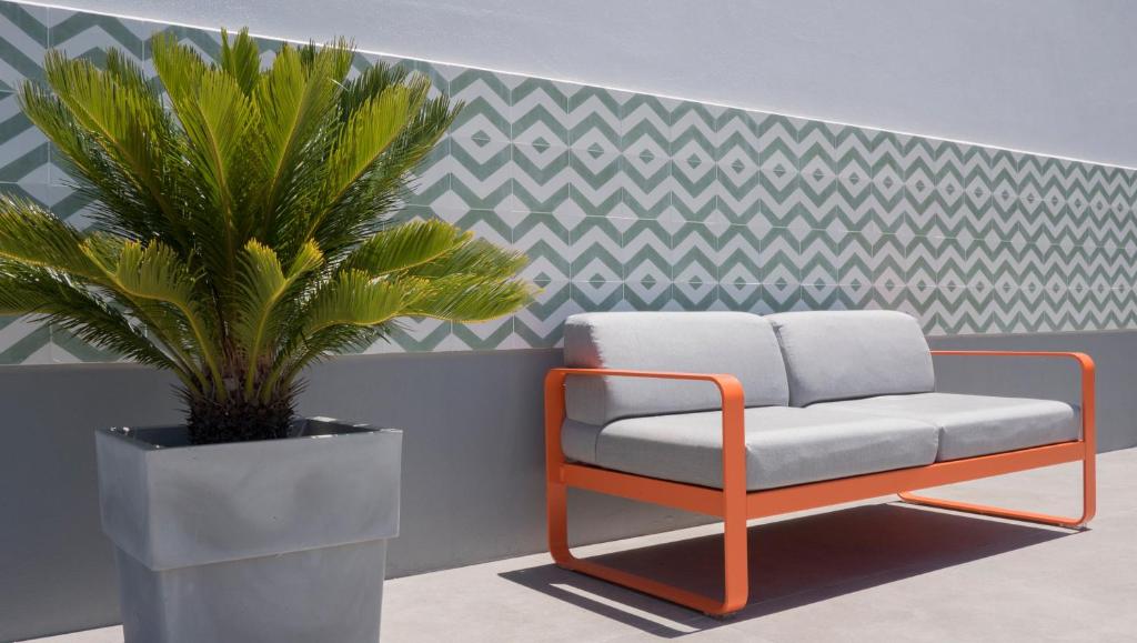 Posezení v ubytování Flamboyant Boutique B&B
