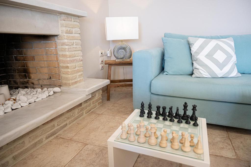 Posezení v ubytování Kalavria Luxury Suites, Afroditi Suite with magnificent sea view and private swimming pool.