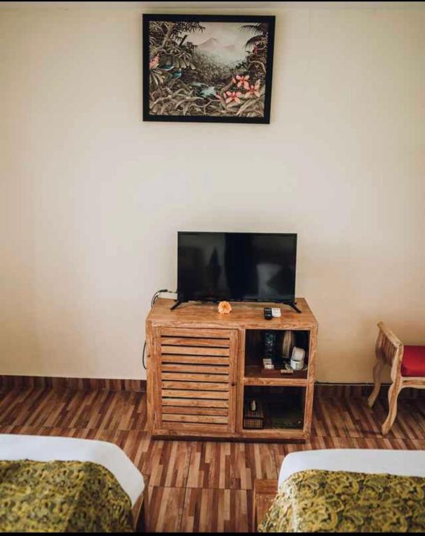 TV a/nebo společenská místnost v ubytování The Sawah Resort & Villa