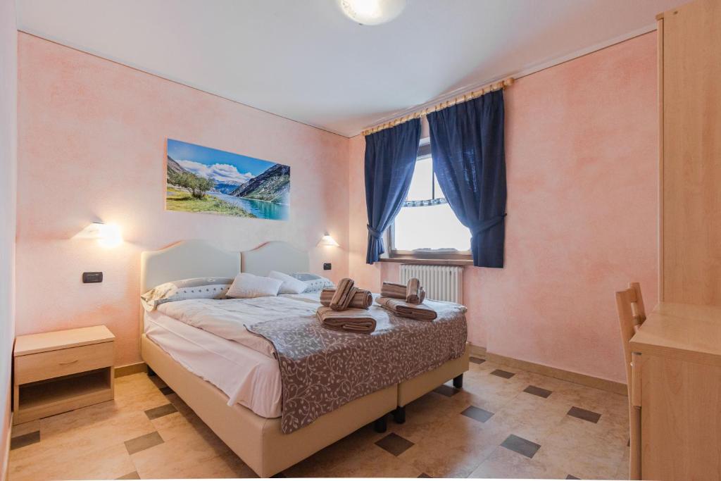 Postel nebo postele na pokoji v ubytování Chalet Li Baita Daniela