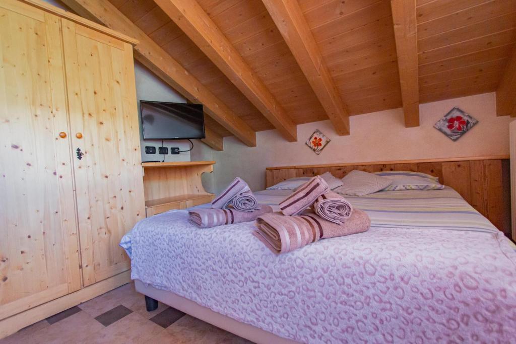 Postel nebo postele na pokoji v ubytování Chalet Li Baita Daniela