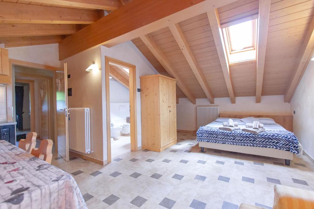 Postel nebo postele na pokoji v ubytování Chalet Li Baita Daniela