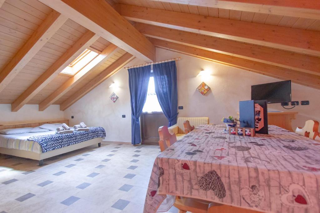 Postel nebo postele na pokoji v ubytování Chalet Li Baita Daniela