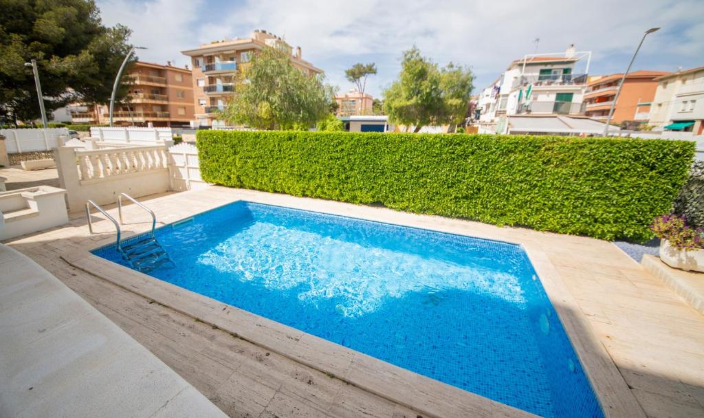 The swimming pool at or close to R126 Beachfront Apartment Sant Salvador