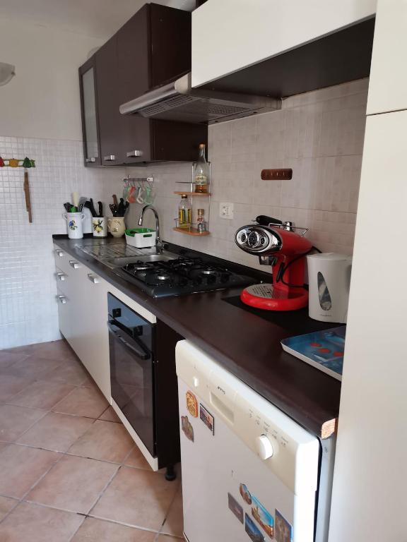 Kuchyň nebo kuchyňský kout v ubytování Casa Mondorosso