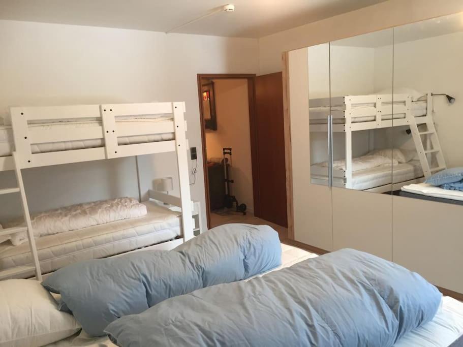 Posteľ alebo postele v izbe v ubytovaní Groot appartement in Aparthotel met prachtig uitzicht