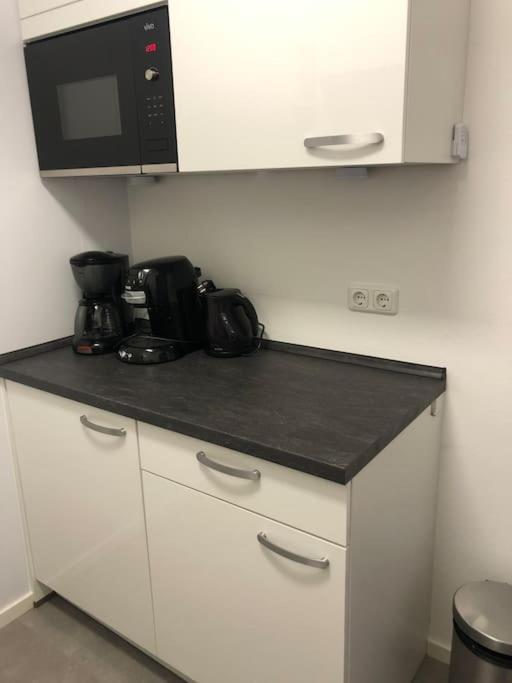 Kuchyňa alebo kuchynka v ubytovaní Groot appartement in Aparthotel met prachtig uitzicht