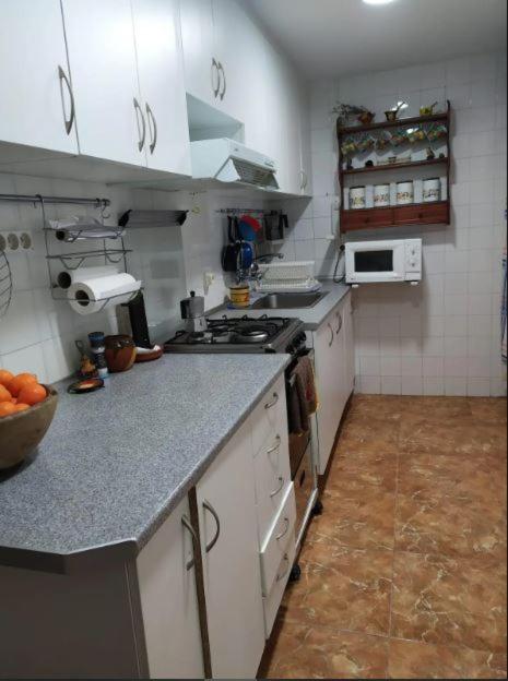 Kuchyň nebo kuchyňský kout v ubytování cañones del turia