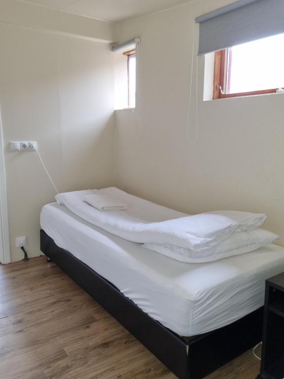 Postel nebo postele na pokoji v ubytování Lindarbrekka