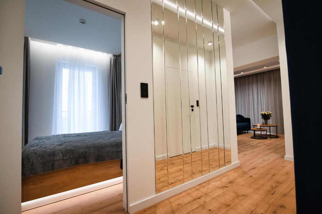Łóżko lub łóżka w pokoju w obiekcie Boutique 62 by Housine