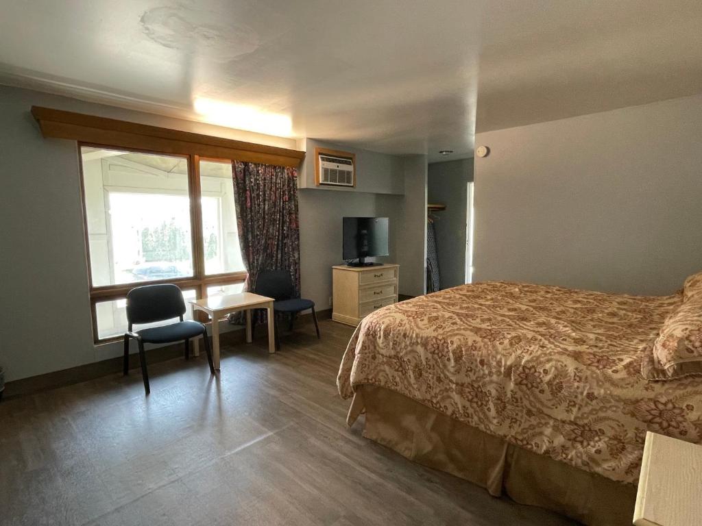Executive Inn - Habitación Deluxe Con Cama Extragrande