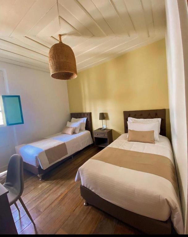 Katil atau katil-katil dalam bilik di Hotel Gio