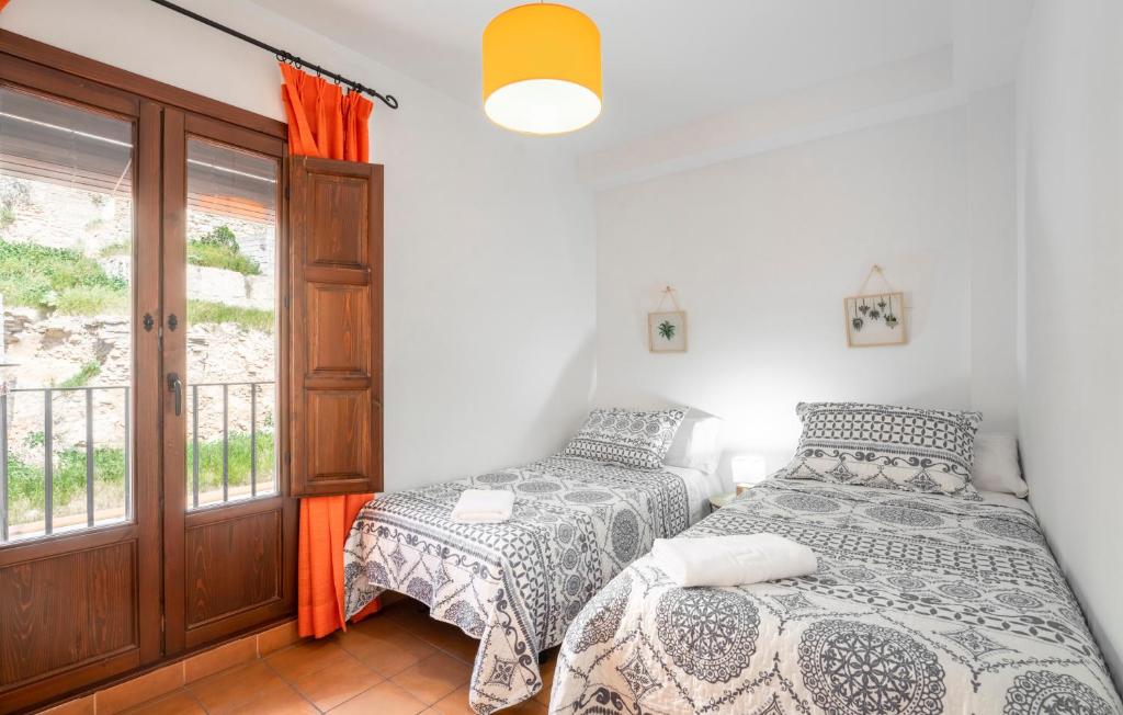 Posteľ alebo postele v izbe v ubytovaní ELVIRA 60 Homes