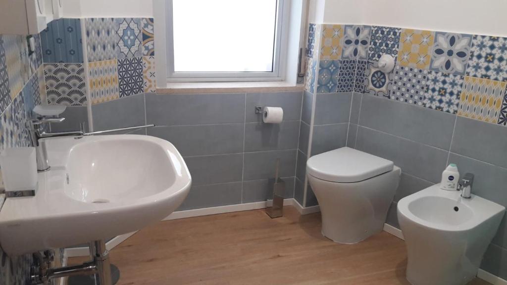 Kúpeľňa v ubytovaní Pecciolo Port Apartaments