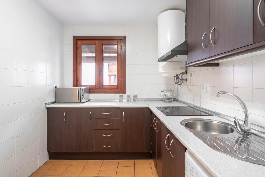 Kuchyňa alebo kuchynka v ubytovaní ELVIRA 60 Homes