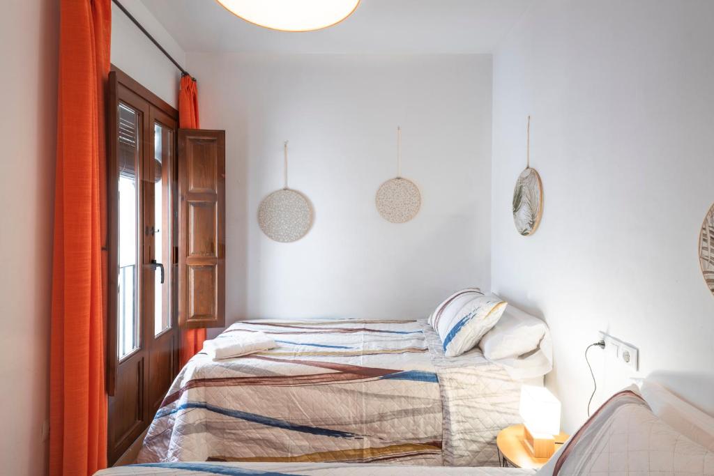 Posteľ alebo postele v izbe v ubytovaní ELVIRA 60 Homes