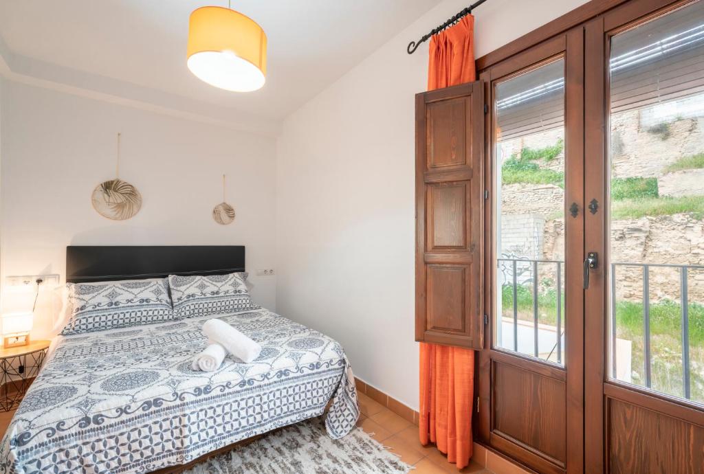 Posteľ alebo postele v izbe v ubytovaní ELVIRA 60 Homes