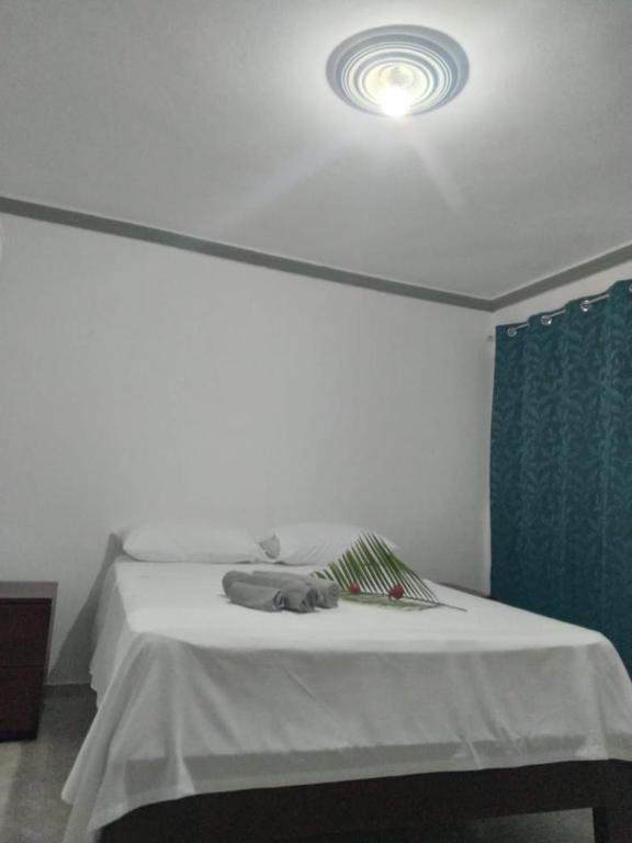 Postel nebo postele na pokoji v ubytování RECIDENCIAL MIGNOLI
