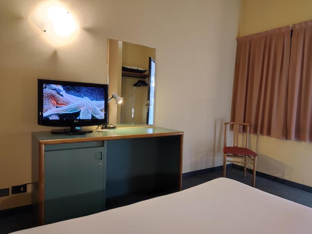 TV a/nebo společenská místnost v ubytování Stay Hotel