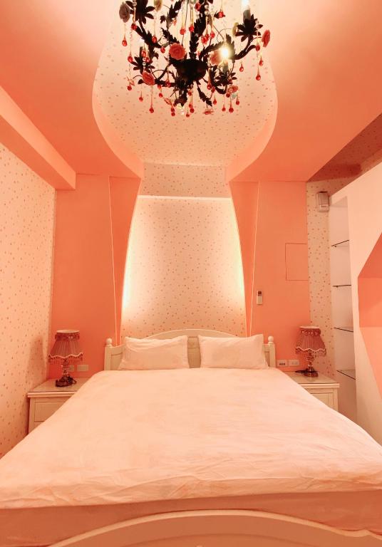 Katil atau katil-katil dalam bilik di CHI-YU B&B