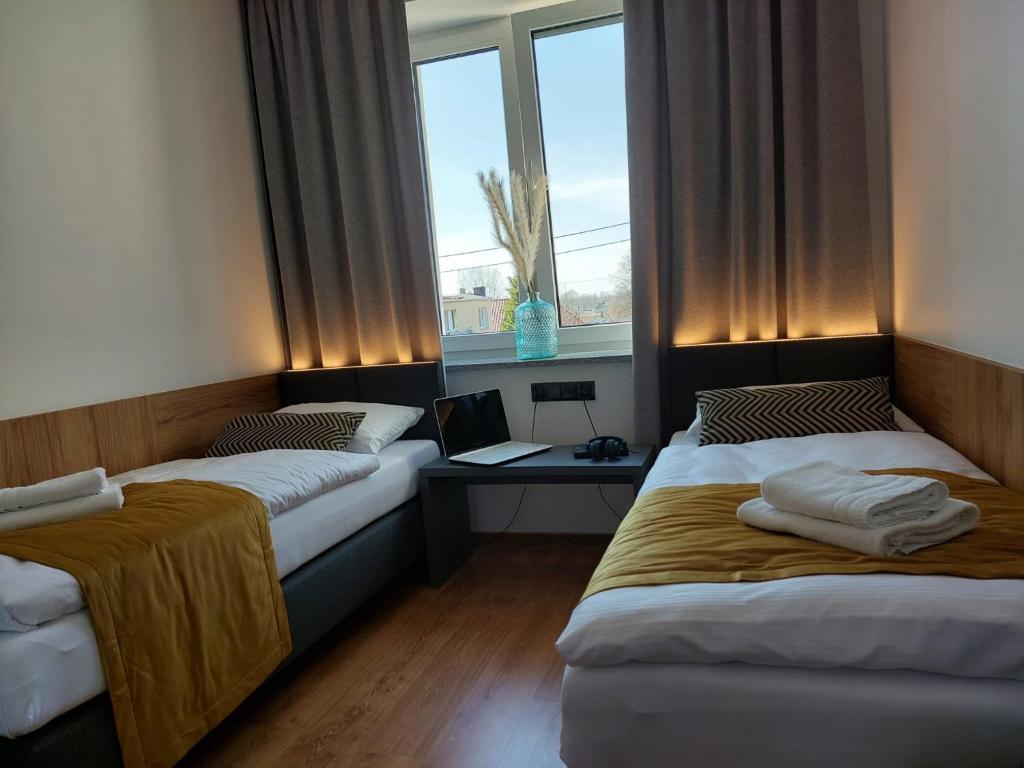 Posteľ alebo postele v izbe v ubytovaní Good Sleep