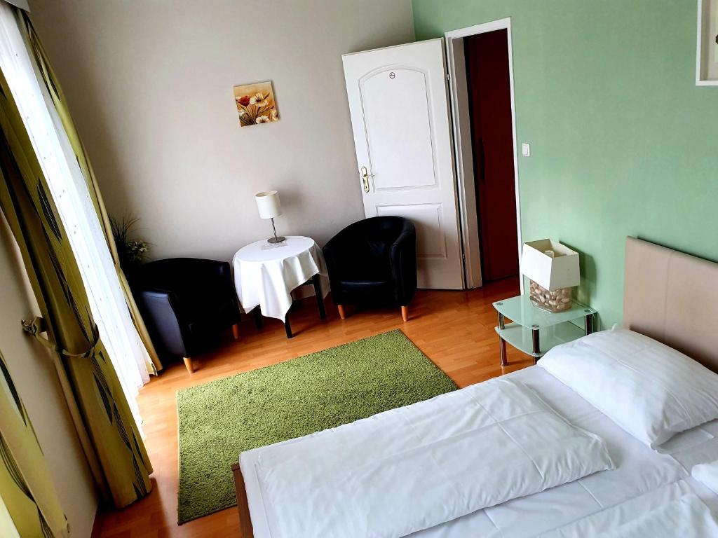 Postel nebo postele na pokoji v ubytování Hotel Hotwagner