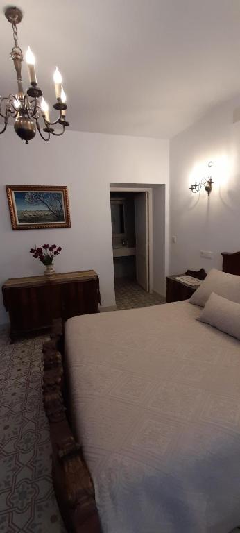 Postel nebo postele na pokoji v ubytování Casa rural La Golondrina