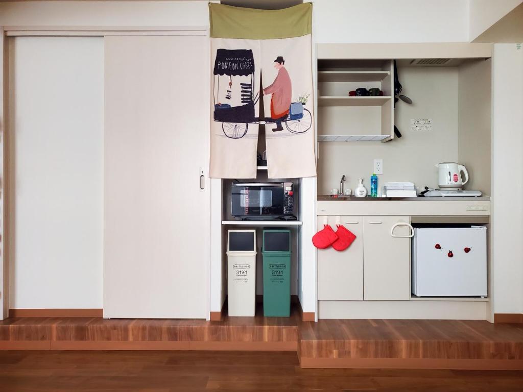 Kuchyň nebo kuchyňský kout v ubytování Rooms
