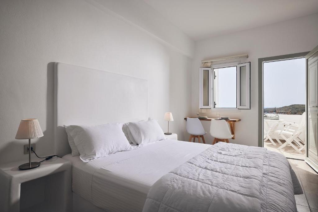A bed or beds in a room at Kanala Studios