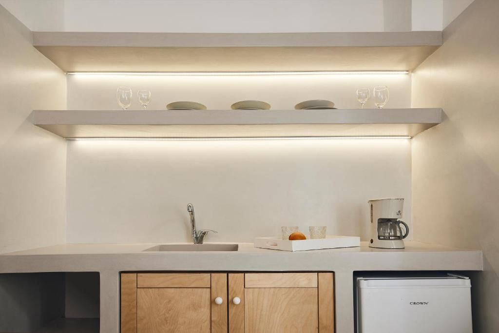 A kitchen or kitchenette at Kanala Studios