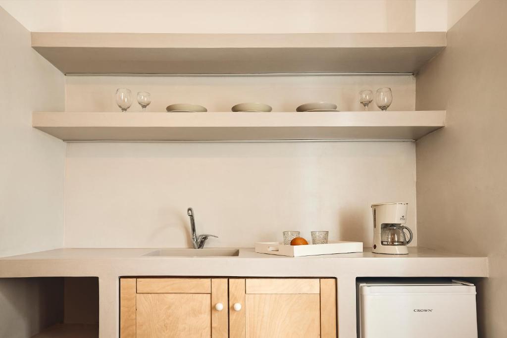 A kitchen or kitchenette at Kanala Studios