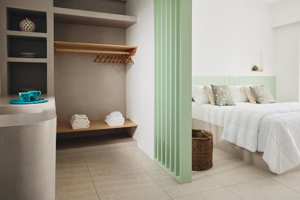 A bed or beds in a room at Kanala Studios