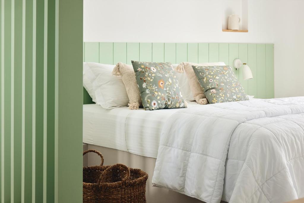 A bed or beds in a room at Kanala Studios