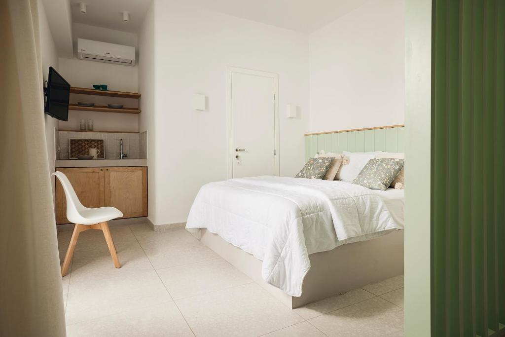 A bed or beds in a room at Kanala Studios