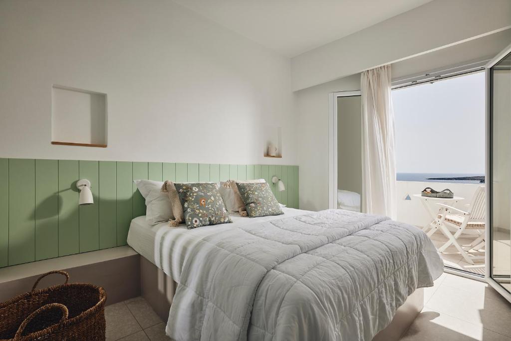 A bed or beds in a room at Kanala Studios