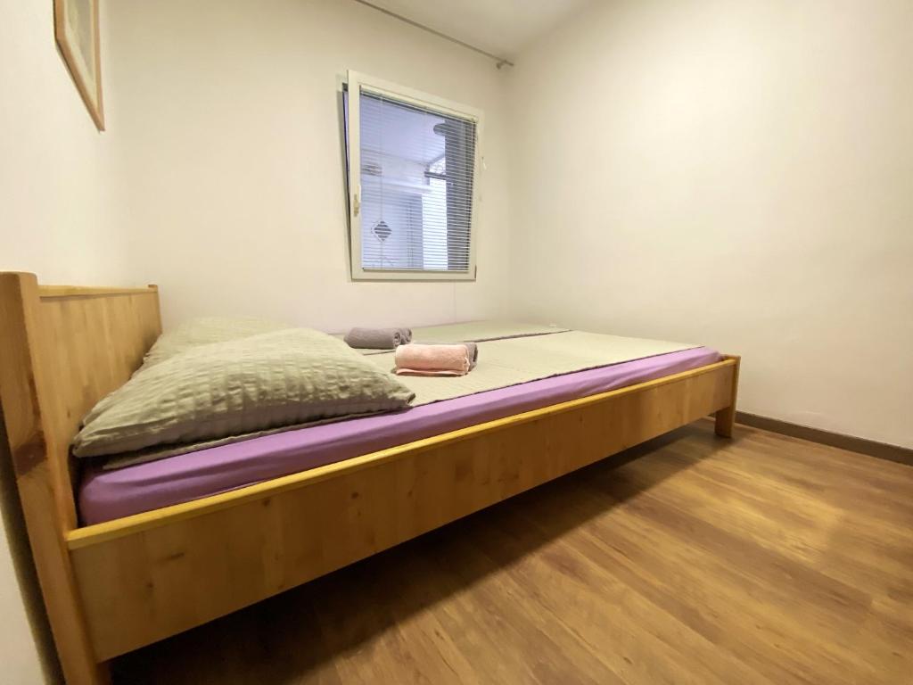 a bed in a room with a window at Modern Apartment in Vodice / 45 m² / Stunning Sea View in Vodice