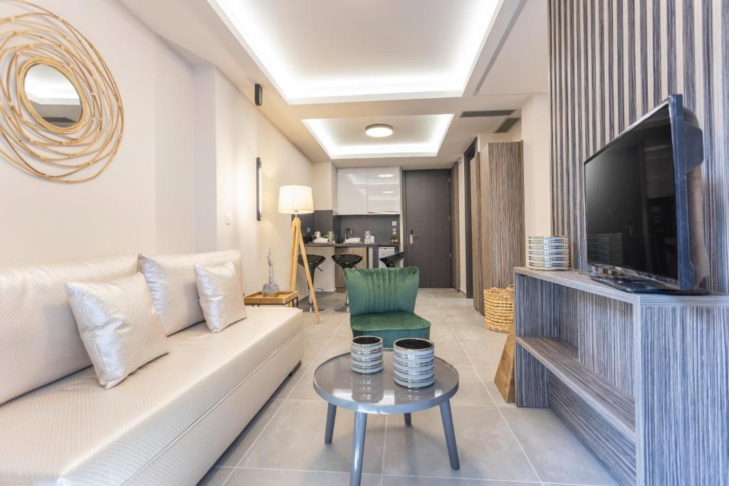 TV a/nebo společenská místnost v ubytování Evitel Luxury Living
