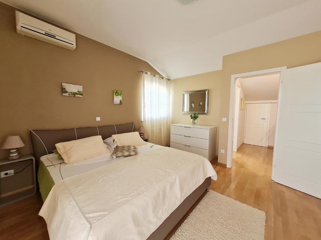 Posteľ alebo postele v izbe v ubytovaní Holiday Home Drago