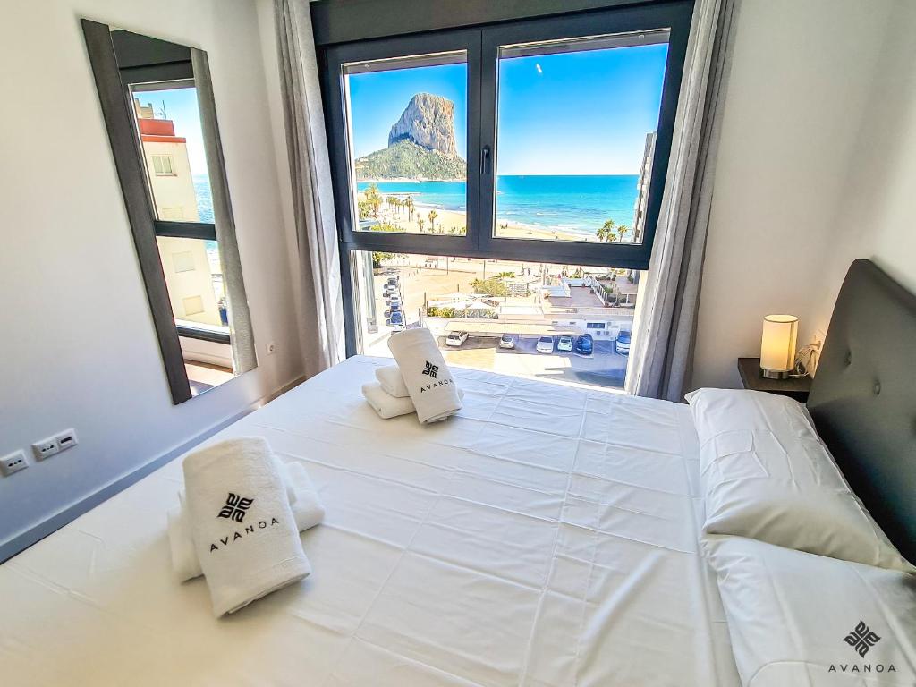 Postel nebo postele na pokoji v ubytování AVANOA - Arenal Suites Calpe